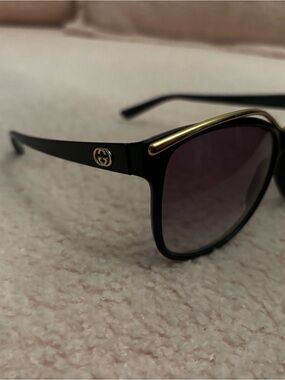 Gucci Black Sunglasses with Gold Detailing and Gradient Lenses